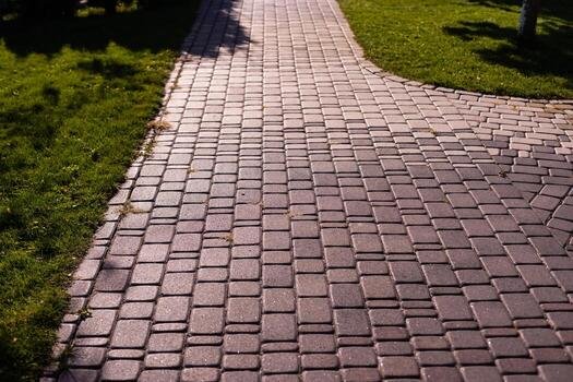 Pavers vs Stamped Concrete: Which Is Better for Lancaster Winters?